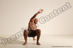 Underwear Gymnastic poses Man Black Muscular Bald Dancing Dynamic poses Academic